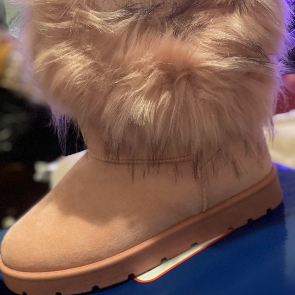 These are  soft pink winter fur boots